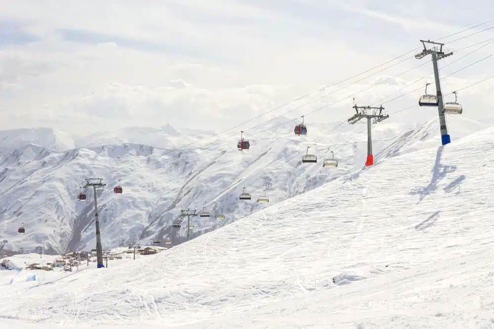 Gudauri,Ski,Resort:,Gondola,(ski,Lift),And,Snow-covered,Caucasus,Mountains